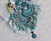 Plastron La Petite Sir&egrave;ne Haute Couture brod&eacute; avec des pierres de gemme de diff&eacute;rentes tailles : Le Howlite Turquoise et la pierre de Lune, perles nacr&eacute;es, rocailles, cristaux et dentelle