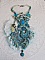 Plastron La Petite Sir&egrave;ne Haute Couture brod&eacute; avec des pierres de gemme de diff&eacute;rentes tailles : Le Howlite Turquoise et la pierre de Lune, perles nacr&eacute;es, rocailles, cristaux et dentelle