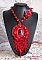 Plastron pendentif Coralie brod&eacute; avec des pierres semi-pr&eacute;cieuses en abondance.