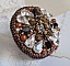 Bague Amber Romance avec cristaux : navettes Jet, Poires Cristal et perles rondes nacr&eacute;es sur une bague couleur Bronze. Les cristaux sont orn&eacute;s de perles magiques et rocailles, un style Am&eacute;rindien