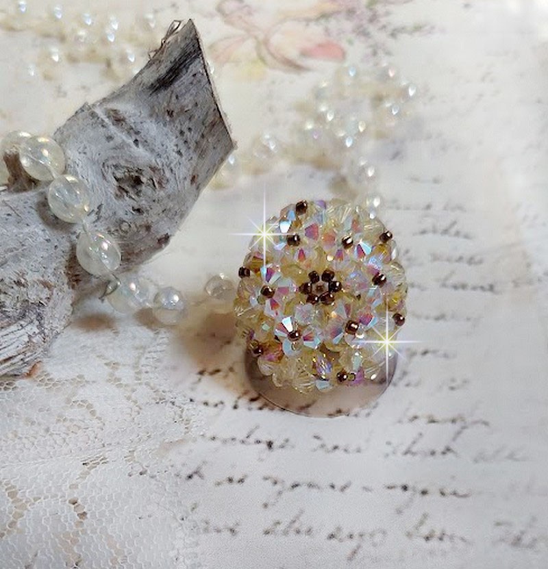 Bague Aurore en cristal Swarovski jonquille et perles dorées.