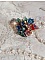 Bague Bel Air mont&eacute;e avec des fleurs lucites peintes &agrave; la main aux couleurs : Bleu, Rose, Rouge, Argent, Blanc avec feuilles ondul&eacute;es Vert Cuivr&eacute; &agrave; laquelle s&rsquo;ajoute perles Dor&eacute;es en Verre