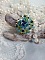 Bague Esp&eacute;rance mont&eacute;e avec toupies Aquamarine AB, Blue Zircon, Capri Blue, Olivine AB, Cristal avec des facettes entrelac&eacute;es avec des rocailles. Elle s&rsquo;adaptera parfaitement &agrave; votre doigt