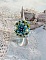 Bague Esp&eacute;rance mont&eacute;e avec toupies Aquamarine AB, Blue Zircon, Capri Blue, Olivine AB, Cristal avec des facettes entrelac&eacute;es avec des rocailles. Elle s&rsquo;adaptera parfaitement &agrave; votre doigt