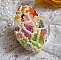 Bague Garden Flowers brod&eacute;e avec des cristaux de Swarovski, des fleurs Lucite et des rocailles