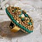 Bague Green Iris brod&eacute;e avec un cabochon Emeraude orn&eacute;e de chatons fleurs cristal sertis, rocailles Vert Opaque et Gold. Mont&eacute;s sur feutrine Verte et sur une bague plateau Dor&eacute;e, un style Contemporain