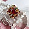 Bague Iroise mont&eacute;e avec des toupies et une navette en Cristal aux couleurs Rouge, Jaune, Topaz et Vert entrelac&eacute;es avec des rocailles Bronze sur des facettes en verre de boh&egrave;me Rouge