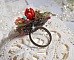 Bague ajustable artisanale ornée d'un bouquet floral en bronze.