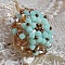 Bague N&eacute;nuphar mont&eacute;e avec toupies Menthe et Light Smoked Topaz en Cristal de Swarovski, facettes en Verre de Boh&egrave;me de m&ecirc;me couleur que les cristaux, entrecrois&eacute;es avec des rocailles Dark Bronze 