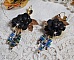 Boucles d'oreilles attrape-rêves artisanales noires et dorées.
