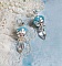 BO Azur&eacute;e Blue avec des pompons Bleu Ciel, cabochons et gouttes torsad&eacute;es en Cristal, coupelles et crochets en Argent 925/1000