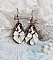 Boucles d'oreilles pendantes style Shabby Chic avec cabochons et cristaux.