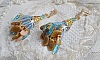 Boucles d'oreilles artisanales style amérindien en nacre et perles.