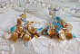 Boucles d'oreilles artisanales amérindiennes en nacre et perles colorées.