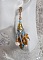 Boucles d'oreilles pendantes artisanales style amérindien en nacre et perles.