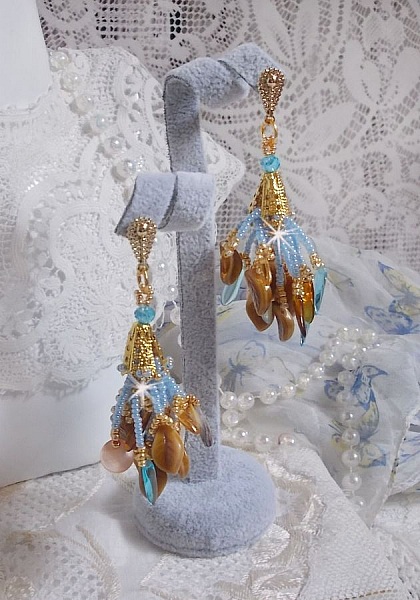 Boucles d'oreilles artisanales style amérindien avec perles et nacre.
