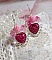 BO C&oelig;ur Ardent mont&eacute;es avec des dormeuses argent&eacute;es &agrave; laquelle s&rsquo;ajoute des c&oelig;urs paillet&eacute;s en r&eacute;sine Fuchsia. Ils sont orn&eacute;s d&rsquo;un bouquet de fleurs en verre &agrave; la couleur Rose pour un style romantique