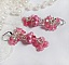 Boucles d'oreilles romantiques en fleurs roses et cristaux Swarovski.