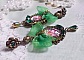 BO C&oelig;ur d&rsquo;Anges avec des cabochons d&rsquo;un petit ange orn&eacute;s d&rsquo;une cha&icirc;ne strass, navettes, poires et cabochons en Cristal. S&rsquo;ajoute des rubans organza sur pendentifs et clous en forme de fleurs.
