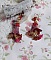 BO Esp&eacute;rance d&rsquo;un Jour avec des fleurs r&eacute;sine et synth&eacute;tique, cha&icirc;ne plaqu&eacute;e or, perles cristal Swarovski.