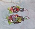 BO Fantasia de Fleurs cr&eacute;&eacute;es avec des Cristaux, des perles rondes nacr&eacute;es, des perles, clochettes en r&eacute;sine, en verre et du ruban Organza Anis