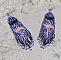 Boucles d'oreilles artisanales en perles motif flamants roses.