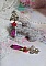 BO Framboises mont&eacute;es avec des perles en Jade, clous, rondelles, coupelles et crochets d'oreilles estampes 