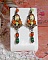 BO F&eacute;es Aloes Potiron repr&eacute;sentant un cabochon d&rsquo;une f&eacute;e aux couleurs roses oranges/Vert Anis, cristaux, estampes et dormeuses Bronze en laiton. Une inspiration d&rsquo;un &ecirc;tre l&eacute;gendaire.