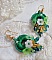 BO Green Iris brod&eacute;es avec du coton DMC Vert sur des anneaux en bois &agrave; laquelle s&rsquo;ajoute des gouttes en cristal, fleurs lucites et rocailles. Mont&eacute;s sur boucles en Laiton. Un style Contemporain !