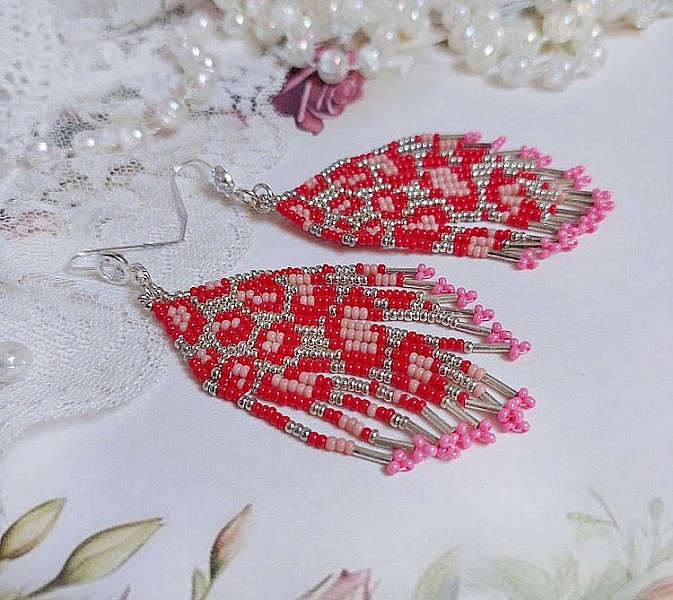 Boucles d'oreilles artisanales en perles de rocaille et argent.