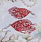 Boucles d'oreilles artisanales en perles de rocaille rouges.