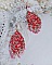Boucles d'oreilles pendantes en perles de rocaille et argent.