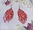 Boucles d'oreilles pendantes en perles de rocaille et argent.