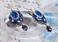 BO Leila avec des cabochons ovales de couleur Royal Blue &agrave; laquelle s&rsquo;ajoute des cabochons ronds, perles nacr&eacute;es et fleurs. Ils sont tous en Cristal, les dormeuses couleur Bronze sont en Laiton
