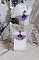 Boucles d'oreilles lilas à pompons et breloques émaillées.