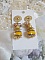 BO Lumi&egrave;re Opale Jaune avec des perles potirons jaunes &agrave; laquelle s&rsquo;ajoute des fleurs, cabochons en cristal, coupelles et perles rondes. Mont&eacute;s sur clous d&rsquo;oreilles en M&eacute;tal. Un style moderne