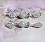 Boucles d'oreilles pendantes scintillantes avec perles strass et cristal.