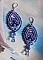 BO Marine Blue brod&eacute;es avec des navettes en Cristal de Swarovski &agrave; laquelle s'ajoute perles rondes en Cristal plasticine, perles nacr&eacute;es, pampilles et rocailles. Mont&eacute;es sur dormeuses en Argent 925