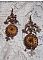 BO Myst&egrave;res d'Ars&egrave;ne cr&eacute;es avec des breloques de diff&eacute;rentes formes, des m&eacute;daillons pendentifs, des motifs en porcelaine patin&eacute;s et des cristaux de Swarovski