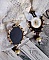 BO Noir Sacr&eacute; Haute Couture brod&eacute;es avec des cristaux : navette, toupies, perles rondes aplaties et rondes &agrave; laquelle s&rsquo;ajoute des perles en Verre et rocailles au couleurs vari&eacute;es
