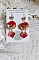 BO Passionn&eacute;ment mont&eacute;es avec des pompons Rouges tr&egrave;s tendances &agrave; laquelle s&rsquo;ajoute des coupelles en forme d&rsquo;arabesque, pendentifs vitrail Rouge/Dor&eacute; et cabochons en Cristal AB sur crochets en Laiton
