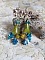 Boucles d'oreilles fleurs acryliques et perles cristal Swarovski.