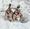 Boucles d'oreilles vintage avec cabochons, nœuds satin et cristaux Swarovski.