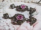 Boucles d'oreilles artisanales angelots avec roses et cristaux.