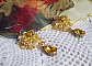 BO Sunflower Gold brod&eacute;es avec des cabochons cristal Jaune, perles nacr&eacute;es, toupies, chatons, cabochons roses Dor&eacute;s M&eacute;tal et rocailles. Le tout est mont&eacute; sur des crochets Gold Filled. 