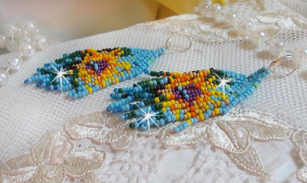 BO Tournesol mont&eacute;es avec des rocailles color&eacute;es de qualit&eacute; en Verre : Bleu Turquoise, Jaune, Orange, Marron, Vert, Noir, Violet et Dor&eacute;. Repr&eacute;sentant ces fleurs, elles sont le symbole du soleil