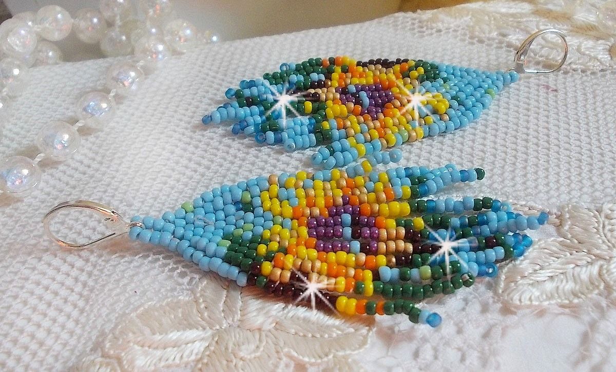 BO Tournesol mont&eacute;es avec des rocailles color&eacute;es de qualit&eacute; en Verre : Bleu Turquoise, Jaune, Orange, Marron, Vert, Noir, Violet et Dor&eacute;. Repr&eacute;sentant ces fleurs, elles sont le symbole du soleil
