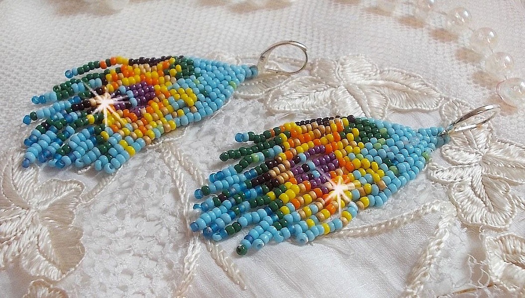 BO Tournesol mont&eacute;es avec des rocailles color&eacute;es de qualit&eacute; en Verre : Bleu Turquoise, Jaune, Orange, Marron, Vert, Noir, Violet et Dor&eacute;. Repr&eacute;sentant ces fleurs, elles sont le symbole du soleil