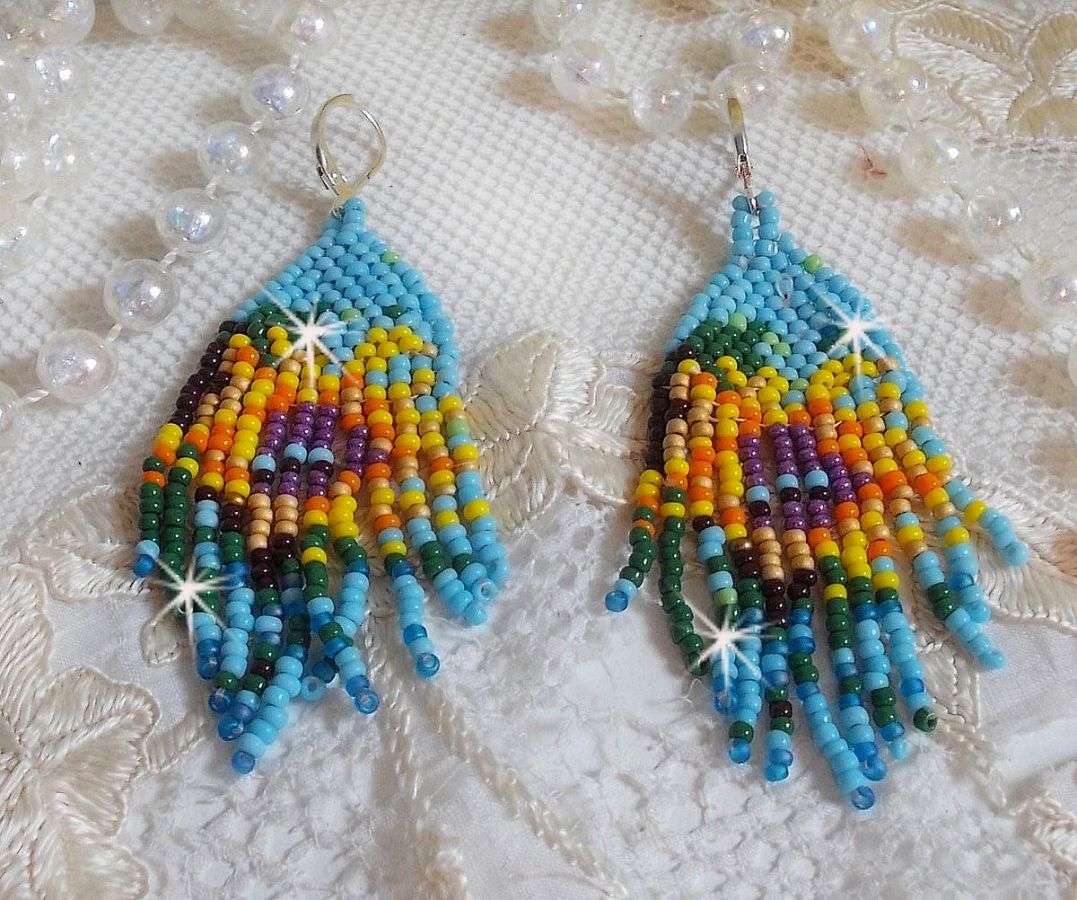 BO Tournesol mont&eacute;es avec des rocailles color&eacute;es de qualit&eacute; en Verre : Bleu Turquoise, Jaune, Orange, Marron, Vert, Noir, Violet et Dor&eacute;. Repr&eacute;sentant ces fleurs, elles sont le symbole du soleil