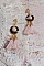 BO Rosy Rose mont&eacute;es avec des cabochons en tissu velours rose poudr&eacute; orn&eacute; d&rsquo;une cha&icirc;ne strass Cristal Noir sur estampes Dor&eacute;es en Laiton. S&rsquo;ajoute des pompons avec c&ocirc;nes M&eacute;tal sur clous en Argent 925